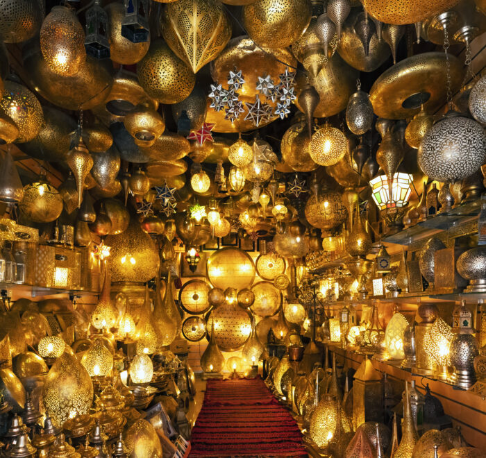 Traditional Moroccan crafts displayed in the bustling souks of Marrakech, including textiles, pottery, and handmade goods